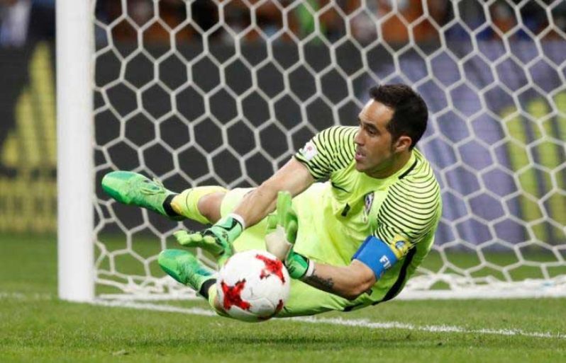 Chile’s Claudio Bravo saves from Portugal’s Nani to win the penalty shootout. (REUTERS/Carl Recine)