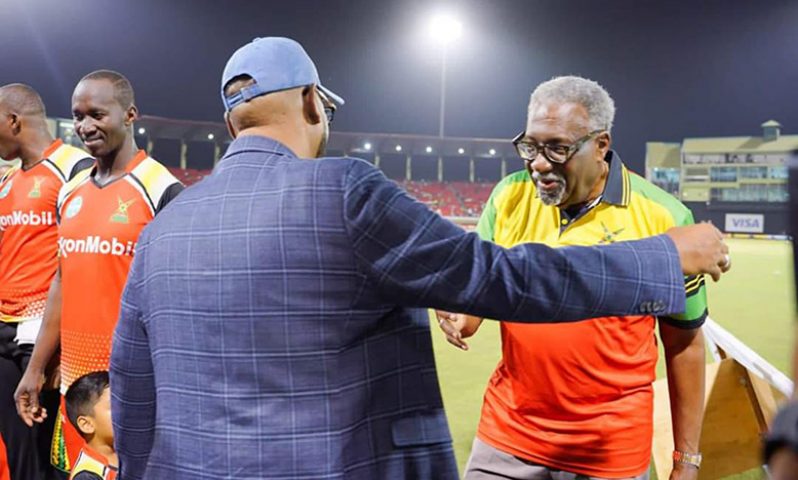 Former West Indies captain, Sir Clive Lloyd embracing His Excellency, President Dr Irfaan Ali