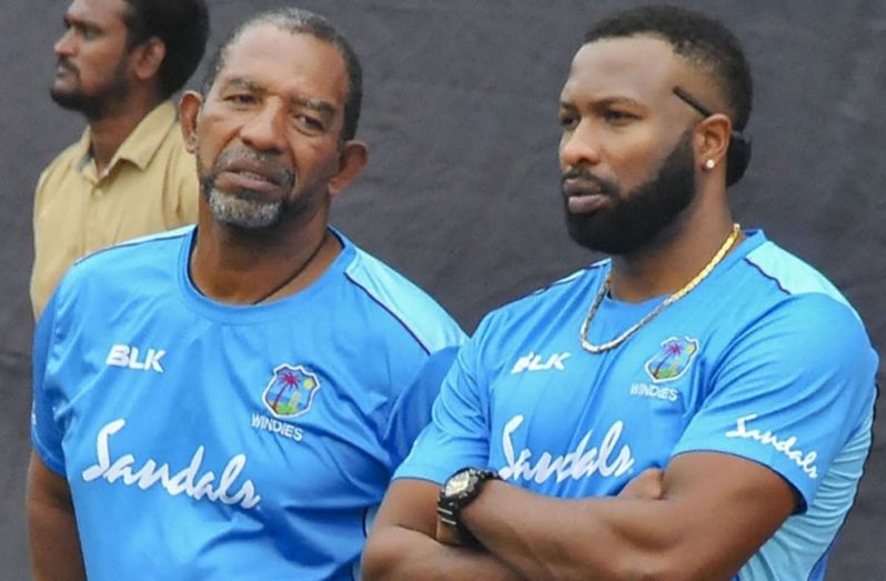 West Indies head coach Phil Simmons (left) and white-ball captain Kieron Pollard