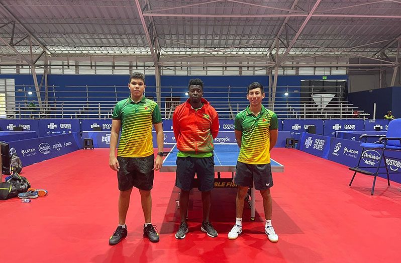 National table tennis players, Jonathan Van Lange (left) and Miguel Wong (right) with coach Idi Lewis