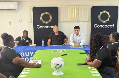 From left: Technical Director Bryan Joseph, new Golden Jaguars Head Coach, Thomas Dooley and General Secretary, Pushpargha Chattopadhyay, along with staff of the Guyana Football Federation
