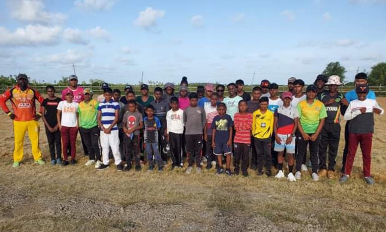 Some of the coaches pose with their charges at the Area H Ground