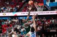 Jamaica’s Kofi Cockburn (centre) completes a lay-up over Puerto Rico’s Jordan Cintron during the first-round FIBA Americas World Cup qualifier in San Juan on November 28, 2025