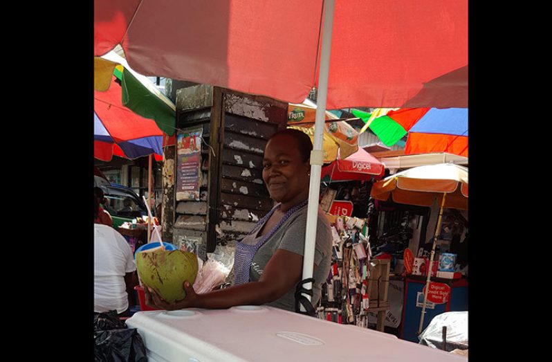 Sharon Smith vending her coconuts in downtown Georgetown.