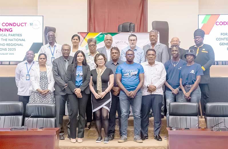 Representatives of the political parties that signed the code of conduct along with commissioners of the ERC on Tuesday (Delano Williams photos)