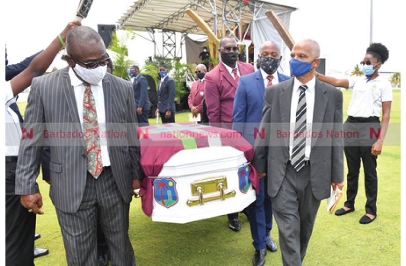 Former West Indies batsman Desmond Haynes (left) and Adrian Donovan leading the casket of Sir Everton Weekes through the guard of honour. (Picture by Kenmore Bynoe) Nation News)