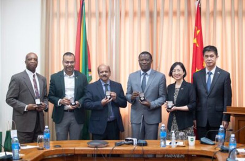 From left: Director, Department of International Co-operation, Ministry of Foreign Affairs and International Co-operation, Ambassador Forbes July; Foreign Secretary, Robert Persaud; Governor of the Bank of Guyana, Dr Gobind Ganga; Foreign Affairs and International Co-operation Minister, Hugh Todd; and Chinese Ambassador to Guyana, Guo Haiyan (DPI photo)