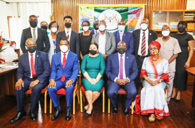 Vice-President of Ghana, Dr. Mahamudu Bawumia (fourth from left), University of Guyana’s Vice-Chancellor, Professor Paloma Mohamed-Martin (third from left) and their representatives. Minister of Foreign Affairs and International Cooperation, Hugh Todd, is seated at second left (DPI photo)