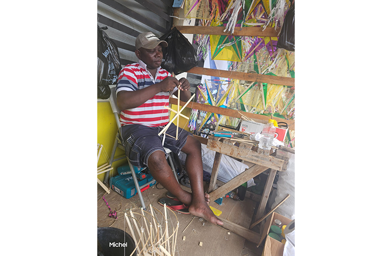 Expert kite-maker Marvin Cole at his kite camp at Buxton