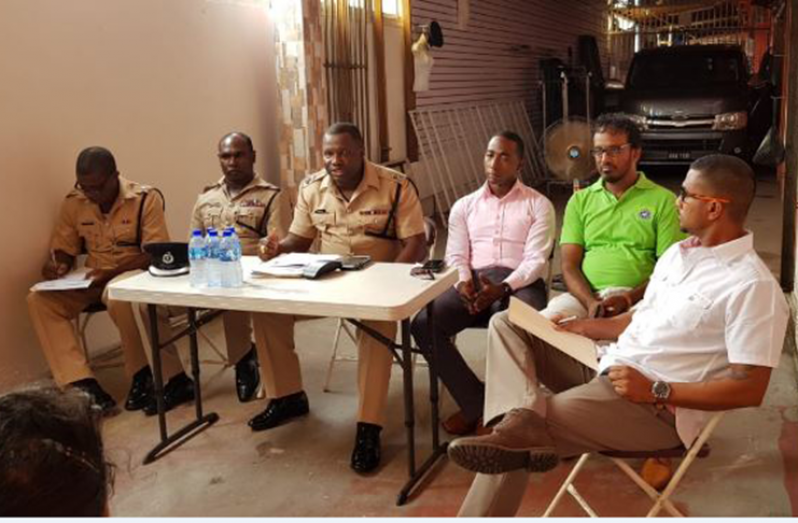 Commander Edmond Cooper (third from left) with his deputy and President of the Region Three Chamber of Commerce Halim Khan (second from right) with other officials at the meeting.