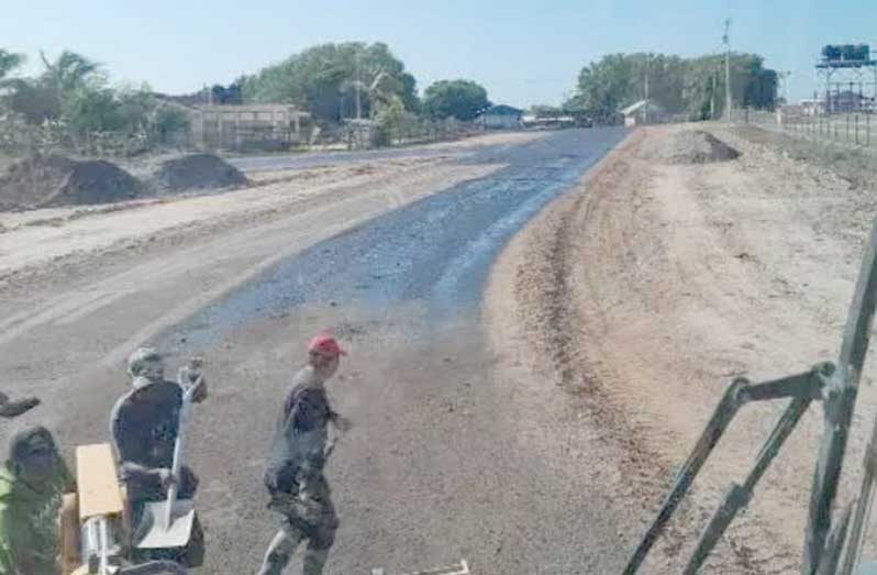 Application of the prime coat on the internal road at Karaudarnau, Region Nine