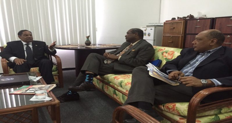 From left are Prime Minister Moses Nagamootoo; Attorney-at-Law Nigel Hughes; and Minister of Governance, Raphael Trotman, in discussion