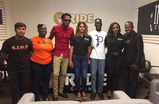 Pastor Kwame Wilson (right) with singer Sean English (third from left) and a few of the representatives from the sponsors