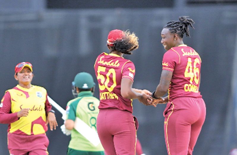 Shamilia Connell (right) celebrates a wicket with Hayley Matthews during yesterday’s opening T20 International against Pakistan.