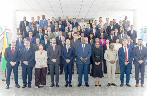 Prime Minister, Brigadier (Ret'd) Mark Phillips (centre at the front) flanked by Minister of Home Affairs, Oneidge Walrond, members of the Guyana Police Force's Executive Leadership Team and Regional and Branch Commanders