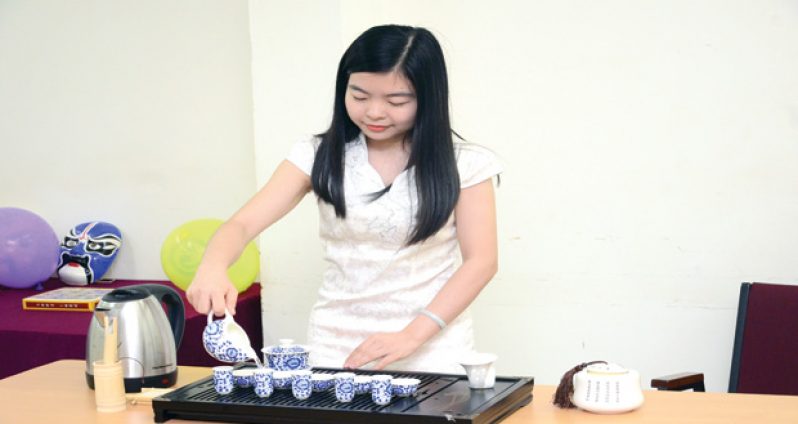 Trista, a member of the Confucius Institute, demonstrating Chinese tea art
