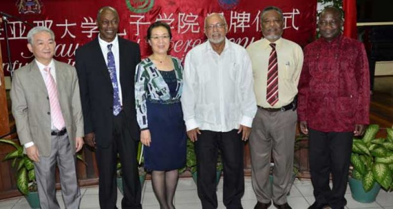 Chinese Ambassador Zhang Limin, Director, Professor Al Creighton, Prime Minister Samuel Hinds, President Donald Ramotar and UG’s Vice Chancellor Jacob Opadeyi