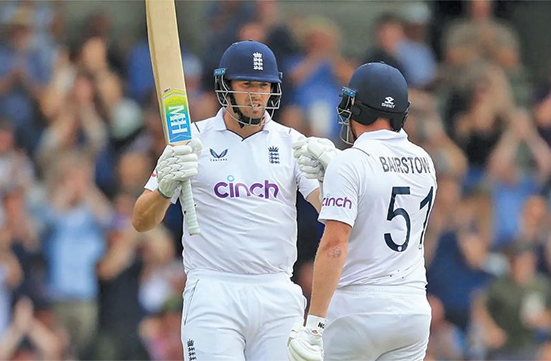 Jamie Overton is congratulated by Jonny Bairstow after reaching fifty in his debut Test (Jun 23, 2022•AFP] via Getty Images)