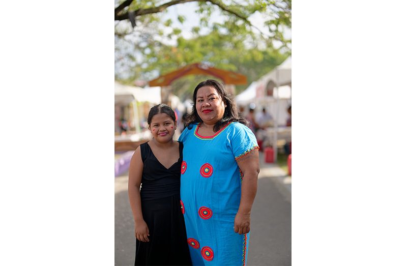 Guyanese indigenous languages teacher and activist, Sabantho Onyi, with her daughter,  Shoko Murutha, who she hopes will learn, preserve, and pass down her indigenous knowledge (Samuel Maughn photo)