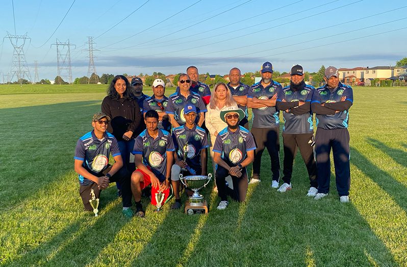 Winners: Guyana Consulate cricket team with Honorary Consul, Mani Singh and Consul General (ag) Grace Sarius-Joseph.