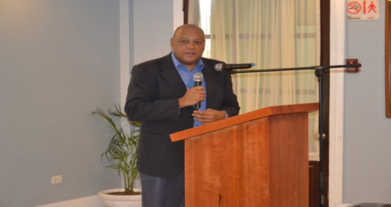 Minister of Governance Raphael Trotman, delivering brief remarks at the event