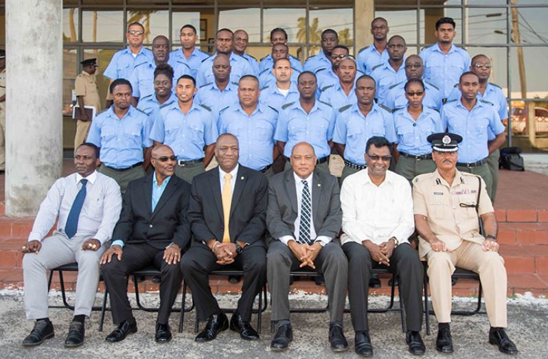 From left seated: Acting Crime Chief, Paul Williams; Director of Compliance, Derrick Lawrence; Minister of State, Joseph Harmon; Minister of Natural Resources, Raphael Trotman; Public Security Minister, Khemraj Ramjattan; and acting Commissioner of Police, David Ramnarine with the corps of wardens (Samuel Maughn Photo)