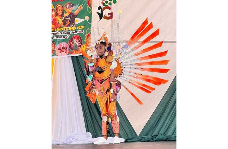 Student costume depicting Bharrat Jagdeo Demerara River Bridge, handmade with local materials, showcasing culture and development