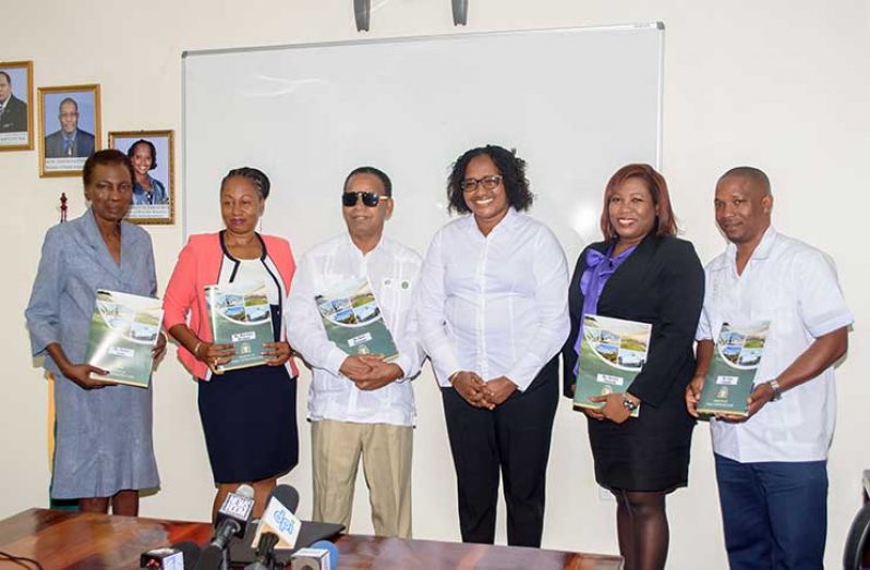 Minister within the Ministry of Public Infrastructure, Annette Ferguson, and some of the newly inducted members of the Transport and Harbours Advisory Council. [L-R: Sandra Jones; Deputy Chair, Marclene Merchant; Chairman, Basil Blackman; Minister Ferguson; Ayesha Edwards; Leon Castello. Absent from photo are Louise Williams and Saheed Sulaman]