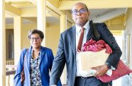 Attorney Nigel Hughes alongside his wife, Catherine, at the High Court in Georgetown on Thursday