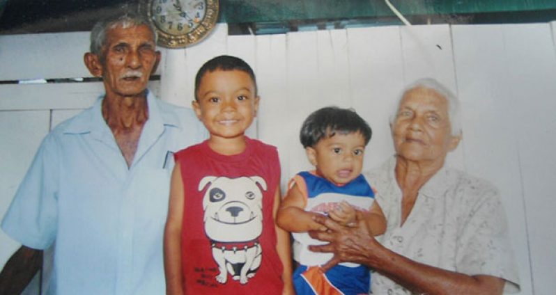 Phulmattie and Rup with two of their great-grandchildren