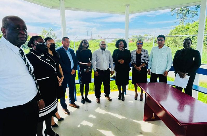 Attorney General Anil Nandlall (second from right); Housing and Water Minister, Collin Croal (fourth from left); Chancellor (ag) of the Judiciary, Justice Yonette Cummings-Edwards (fourth from right); Chief Justice (ag) Roxane George (third from right); Chief Magistrate Ann McLennan (second from left) and other officials at Wednesday’s site-visit (Photo credit: AG Chambers)