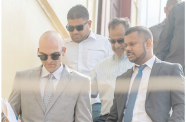 Nazar and Azruddin Mohamed pictured with their attorneys, Siand Dhurjon and Damien Da Silva (Delano Williams photo)