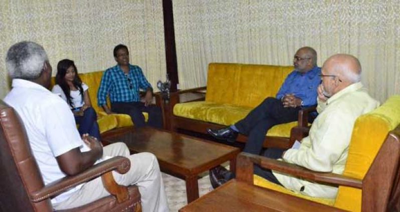 Deep in conversation with the President, Mr Donald Ramotar (right) are, from left, Public Works Minister, Mr. Robeson Benn; Producer of ‘Forgotten Promise’,  Mr. Mahadeo Shivraj; Promoter and cast member,  Mr. Neaz Subhan; and Ms. Tonya Singh