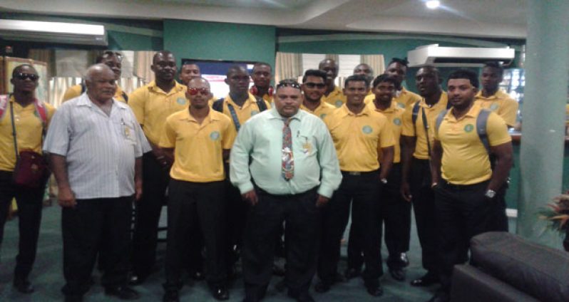 GCB vice-president Fizul Bacchus and president Drubahadur with the Guyana Jaguars team yesterday upon their arrival.