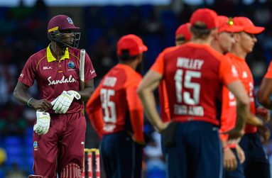 Jason Holder walks off after making a golden duck. (AFP)