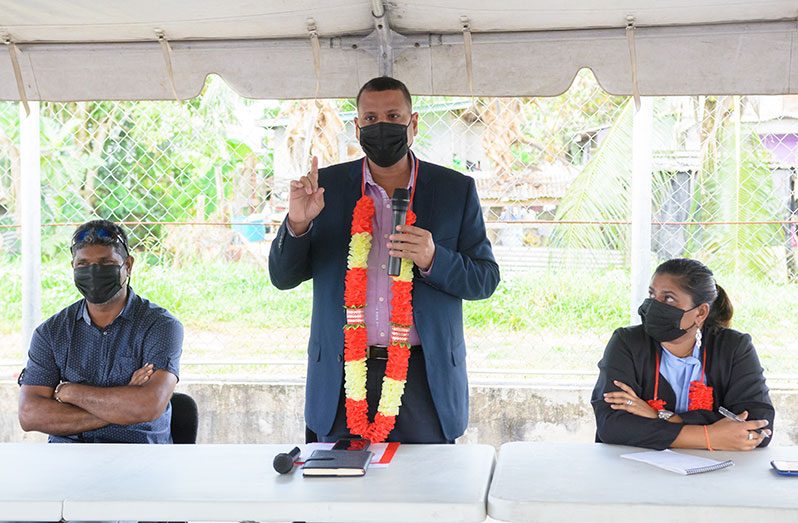 Minister of Housing and Water, Collin Croal, addresses residents of Diamond/Grove on Thursday