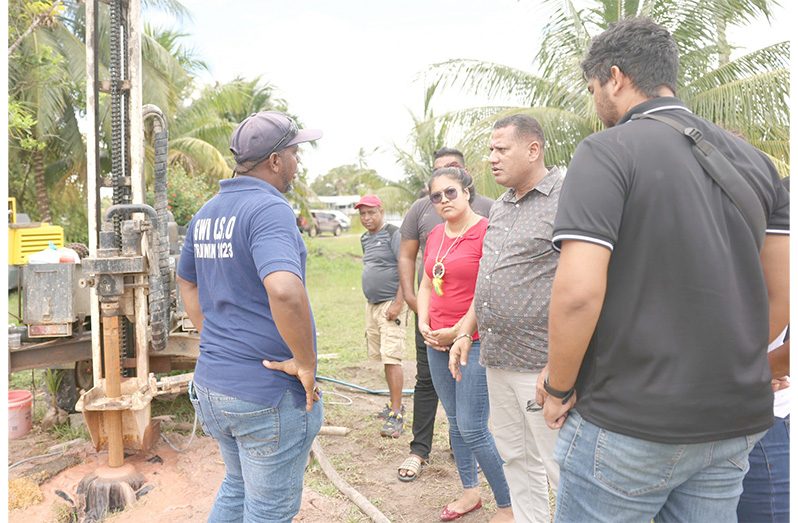 The Minister of Housing and Water, Collin Croal, along with representatives from Guyana Water Incorporated (GWI) and Regional Officials, during his recent visit to the site of a new well being drilled in Acquero, Region One (Barima-Waini)