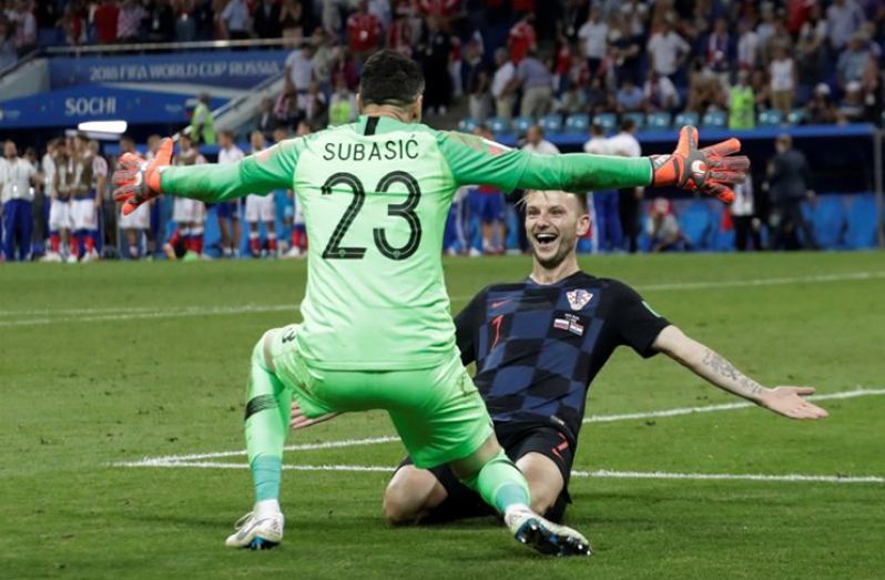 Croatia's Ivan Rakitic celebrates with Danijel ...(Reuters photo)