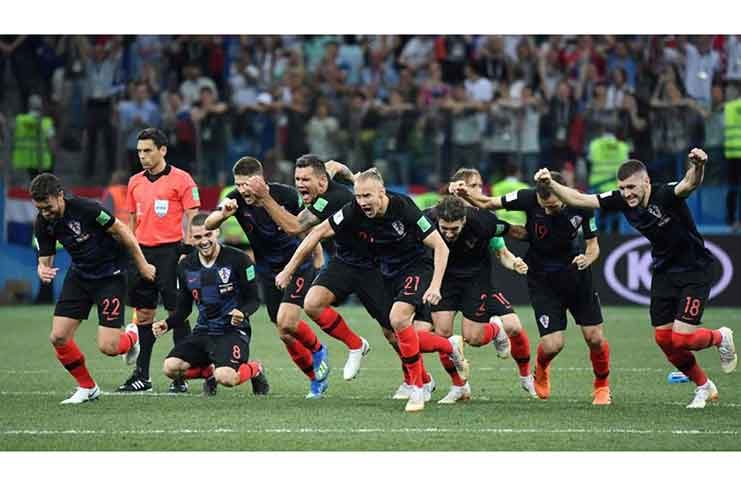 Croatia players celebrate after their win against Denmark on penalties.