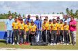 Cropper Primary School with the championship trophy alongside members of the oganising team, FL Sport, and officials from ExxonMobil Guyana