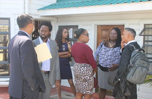 Members of the Guyana Trans United and SASOD along with their Attorneys, Arif Bulkan and Gino Persaud following the ruling. [Ravin Singh photo]