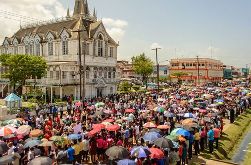 A section of the crowd during the peaceful protest outside of City Hall, against the recently-introduced metered parking system in Georgetown