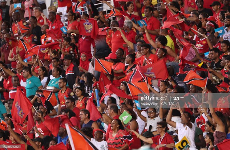 In this handout image provided by CPL T20, Fans of Trinbago Knight Riders look on during the Hero Caribbean Premier League Final between Trinbago Knight Riders and Guyana Amazon Warriors at Brian Lara Stadium on September 16, 2018 in Tarouba, Trinidad and Tobago. (Photo by Ashley Allen - CPL T20/Getty Images)