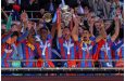 Crystal Palace players lift the trophy after the FA Cup final between Manchester City and Crystal Palace at the Wembley Stadium in London / AP