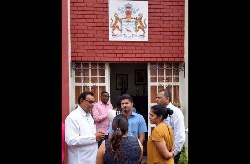 Having a chat outside the Guyana Mission in Cuba are, from left, Ambassador Halim Majeed; CMO, Dr. Shamdeo Persaud; and GMC’s Drs Navindra Rambarran, and Frank Anthony. Backing the camera are post-graduate medical students, Drs. Malaika Singh (left) and Menawattie Rajkumar