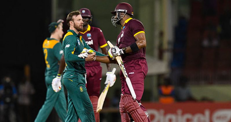de Villiers congratulates Pollard during Match 1 of the Ballr Cup Tri-Nation Series between West Indies and South Africa at Guyana National Stadium, Providence on Friday June 3, 2016. (Photo by WICB Media/Randy Brooks of Brooks Latouche Photography)