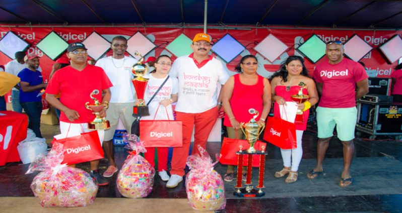 Winners of the 5th Annual Curried Duck Competition and senior Digicel managers