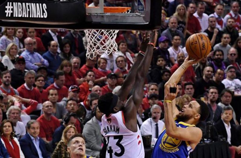 :  Toronto, Ontario, CAN; Golden State Warriors guard Stephen Curry (30) shoots the ball against Toronto Raptors forward Pascal Siakam (43) in game two of the 2019 NBA Finals at Scotiabank Arena. Mandatory Credit: Kyle Terada-USA TODAY Sports