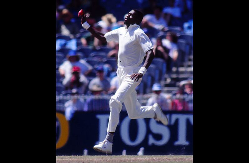 Curtly  Ambrose steams in on the 1992-93 tour of Australia // Getty