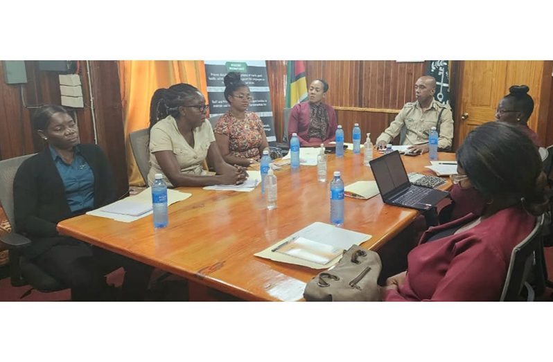 Director of Prisons Nicklon Elliot with former Superintendent of Prisons Philip Bandoo and other GPS officials (GPS photo)